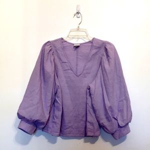 Casual purple shirt with a v-neck